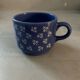 Vintage blue cup with flower decor