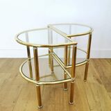 Pairs of gilded metal bedside tables and glass tops