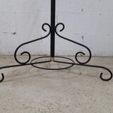 Porte-manteau noir vintage avec accent doré