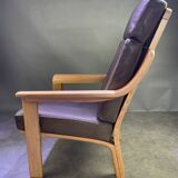 Chocolate leather armchair, wooden structure