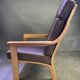 Chocolate leather armchair, wooden structure