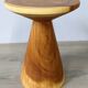 Minimalist side table in solid suar wood with conical legs.