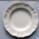 Set of 11 hollow plates of Sarreguemines, ivory color