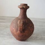 Old anthropomorphic terracotta vase pitcher