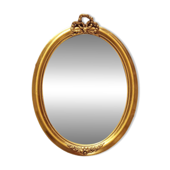 Gilded wood medallion mirror