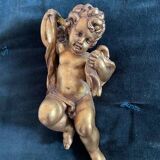 Paire d'anges en bois doré à la feuille d'or