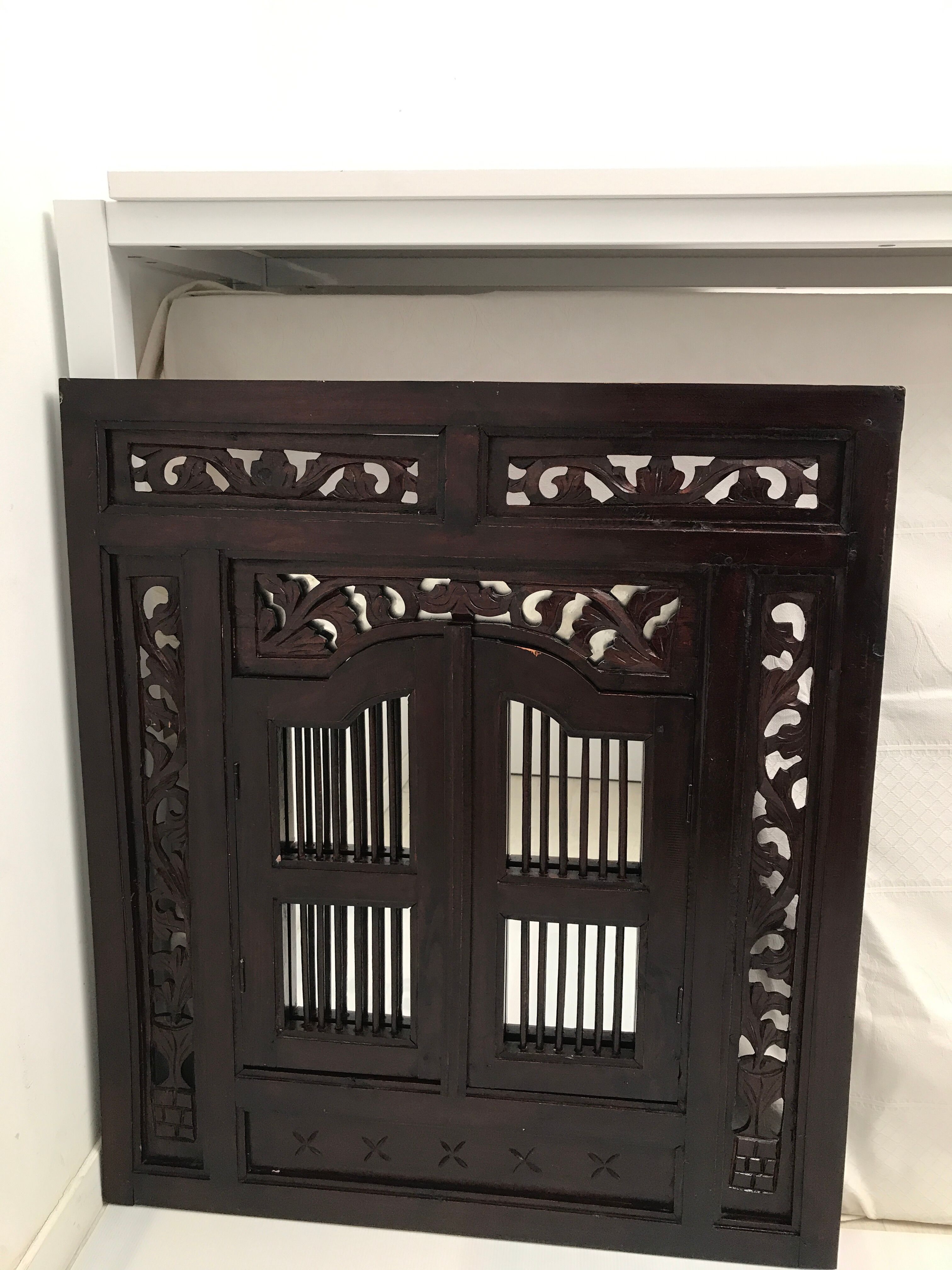 Vintage shuttered Indonesian mirror