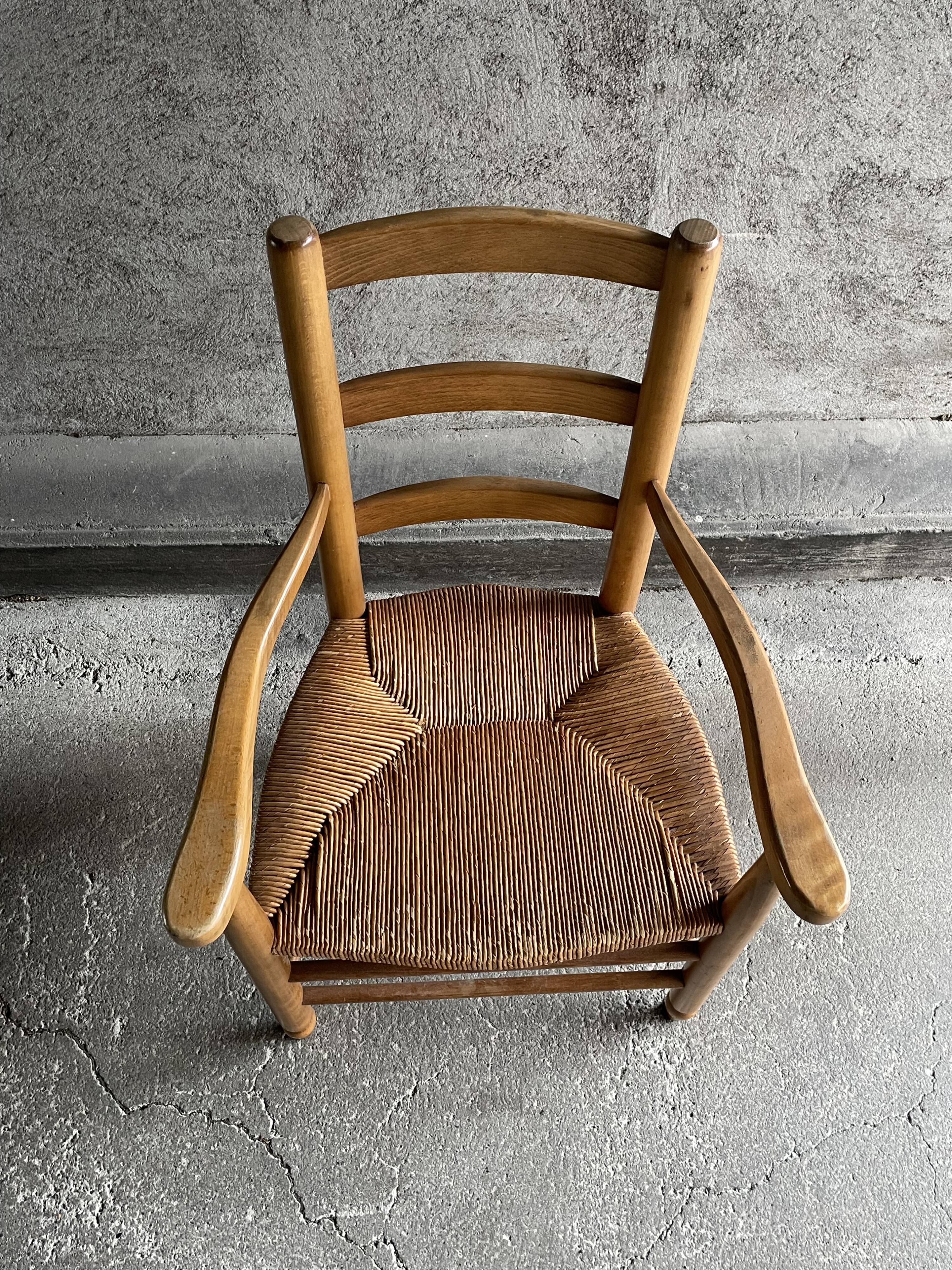Straw chair with armrests, France