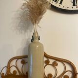 Old stoneware bottle vase