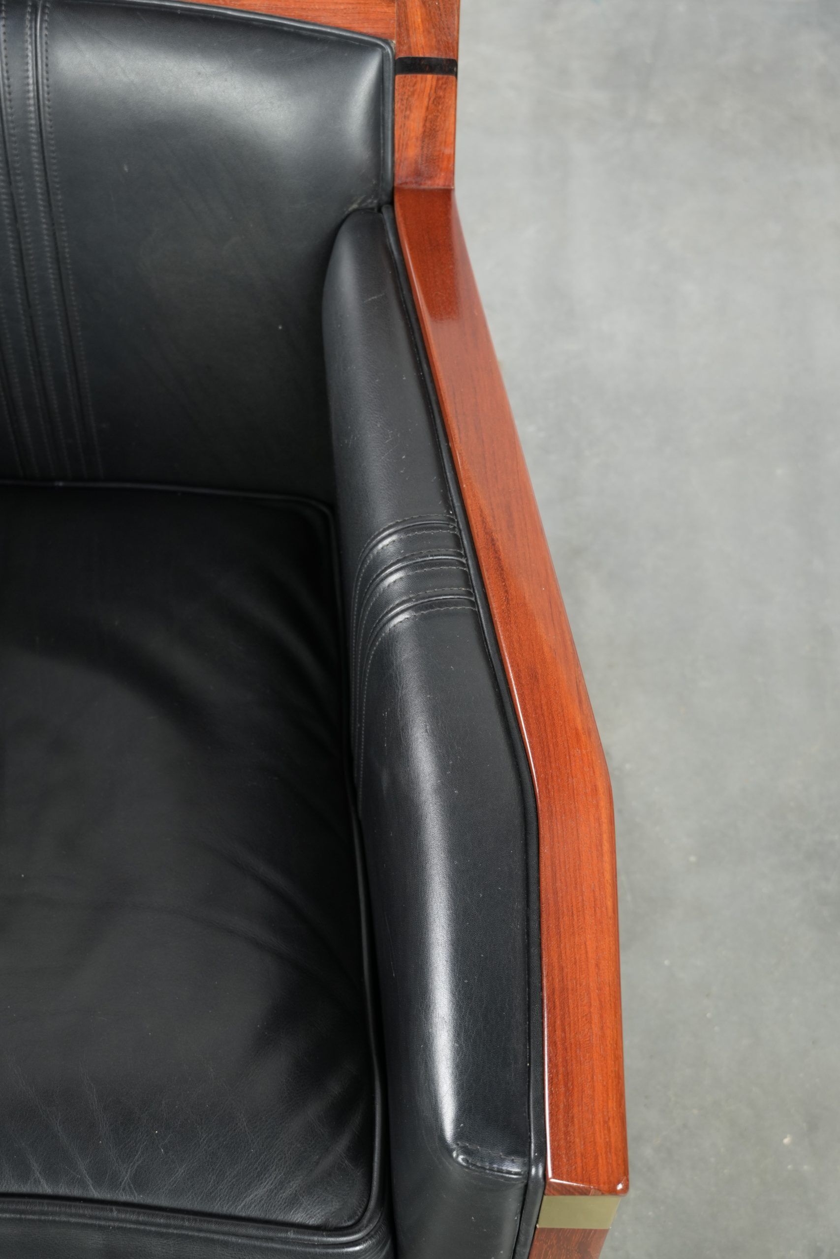 Black leather and wooden Art Deco design armchair