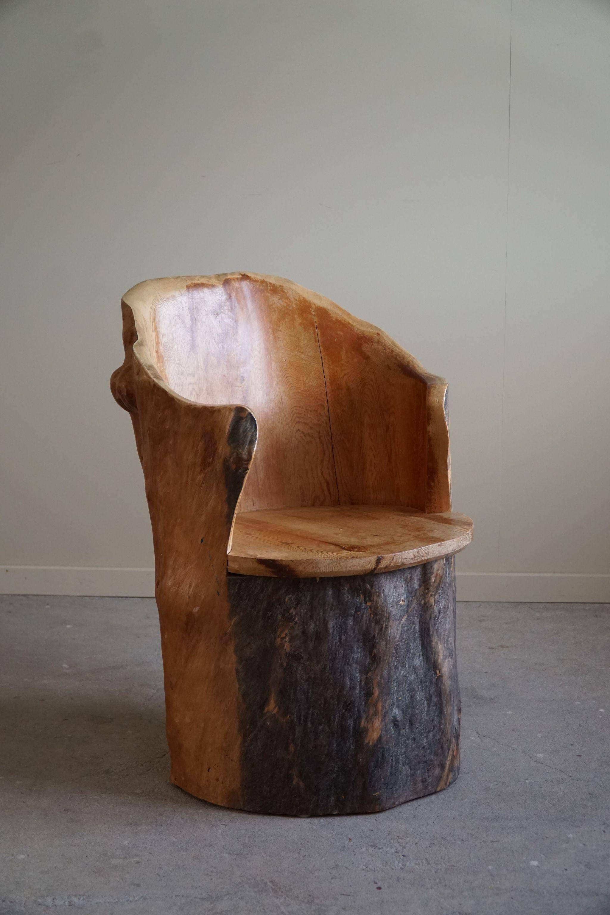 Sculptural brutalist armchair handcrafted in solid pine, Wabi Sabi style, Sweden, 1970s.