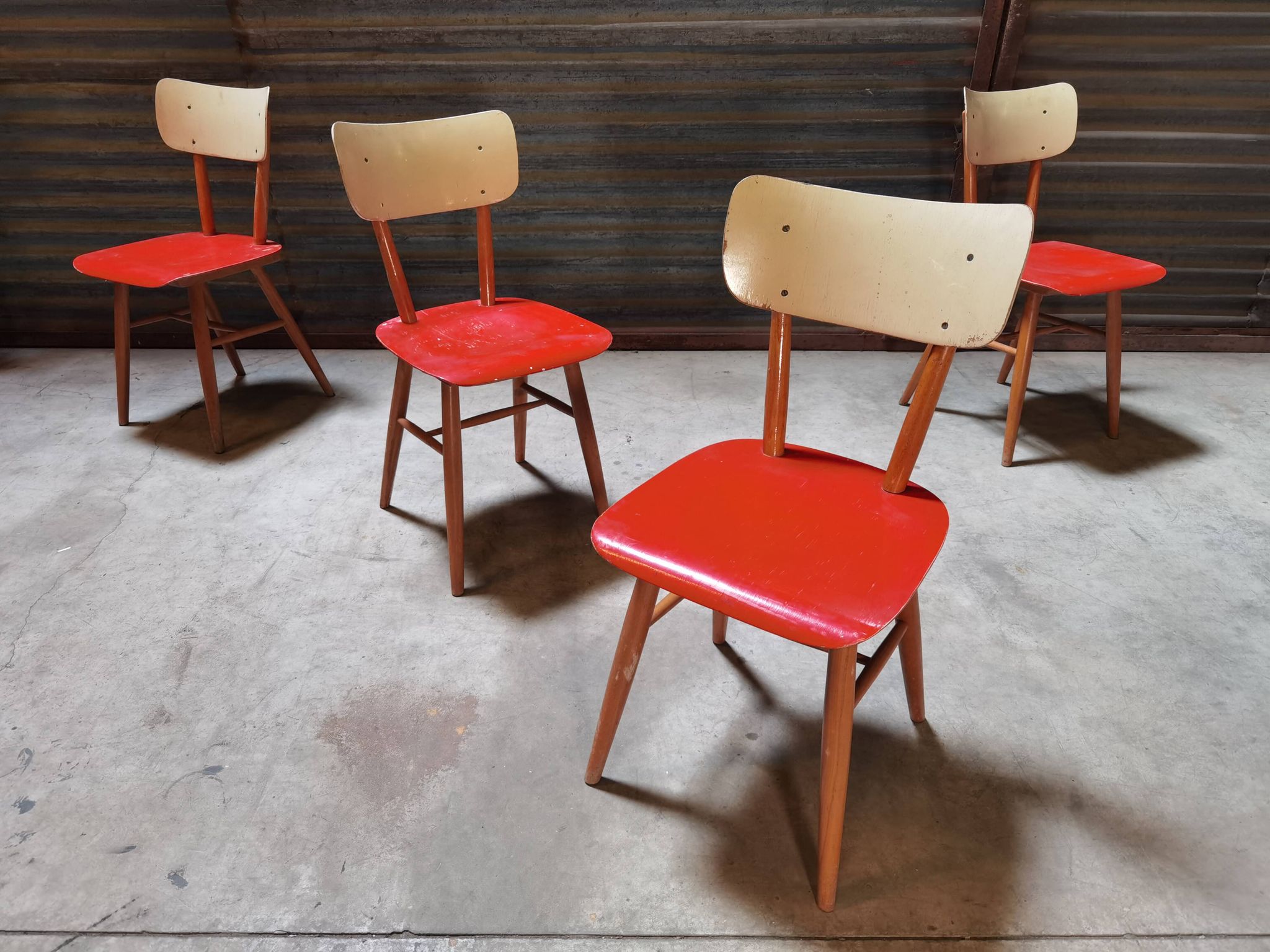 Set of 4 red wooden chairs published by Ton, 60s