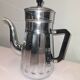 coffee maker, sugar bowl and iron milk jar