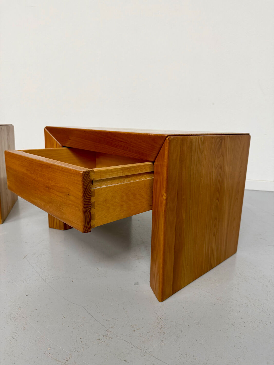 2 bedside tables in elm, designed by Maison Regain, France, 1970s.