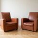 Pair of vintage brown leather club chairs