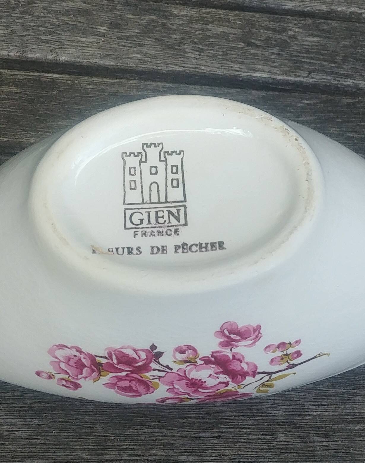 Porcelain saucière of the Gien earthenware factory model "peach blossoms"