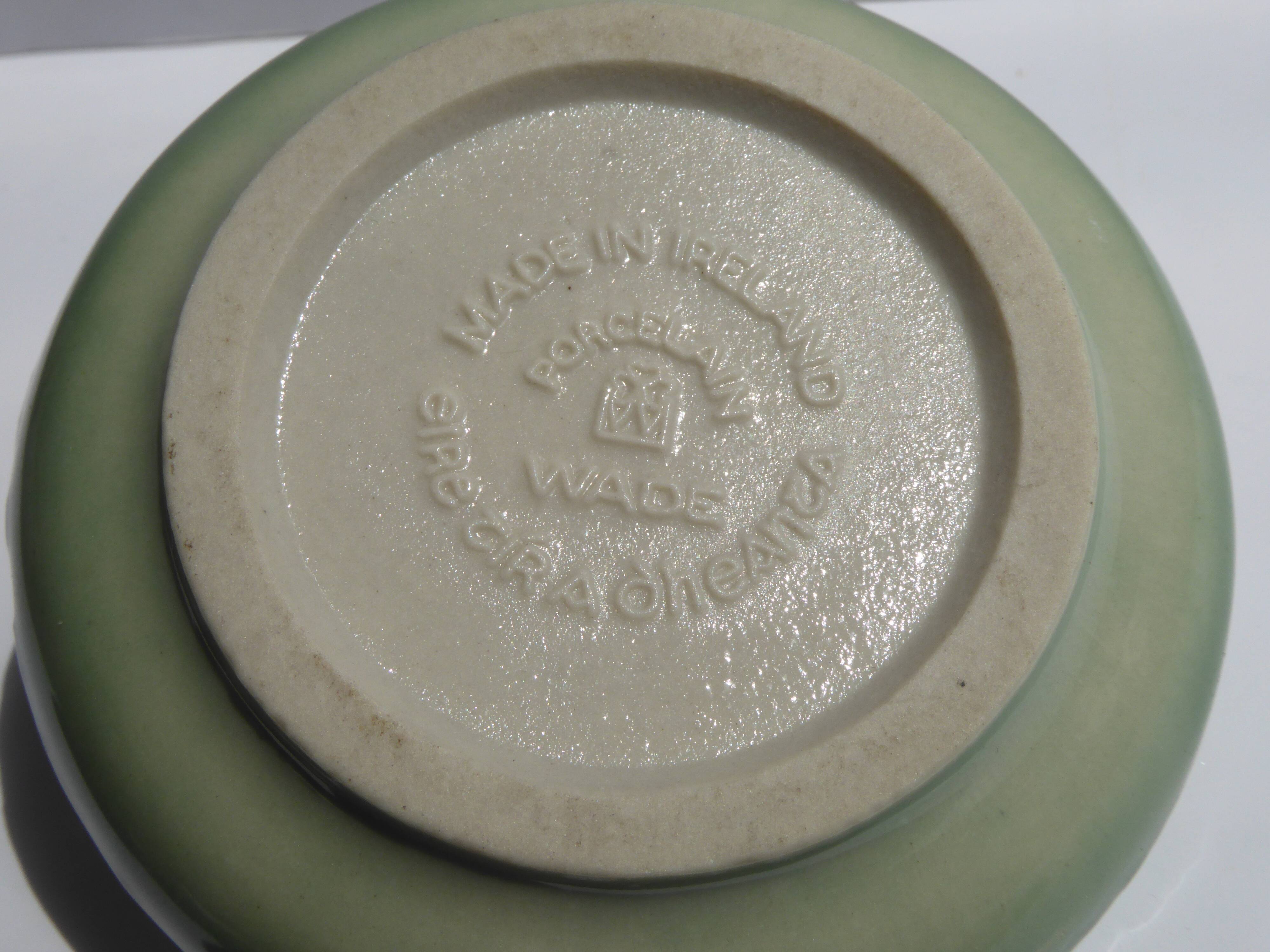 Cup with fish decoration in Irish porcelain