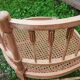 Corner chair in beech, caned seat from the early 20th century.