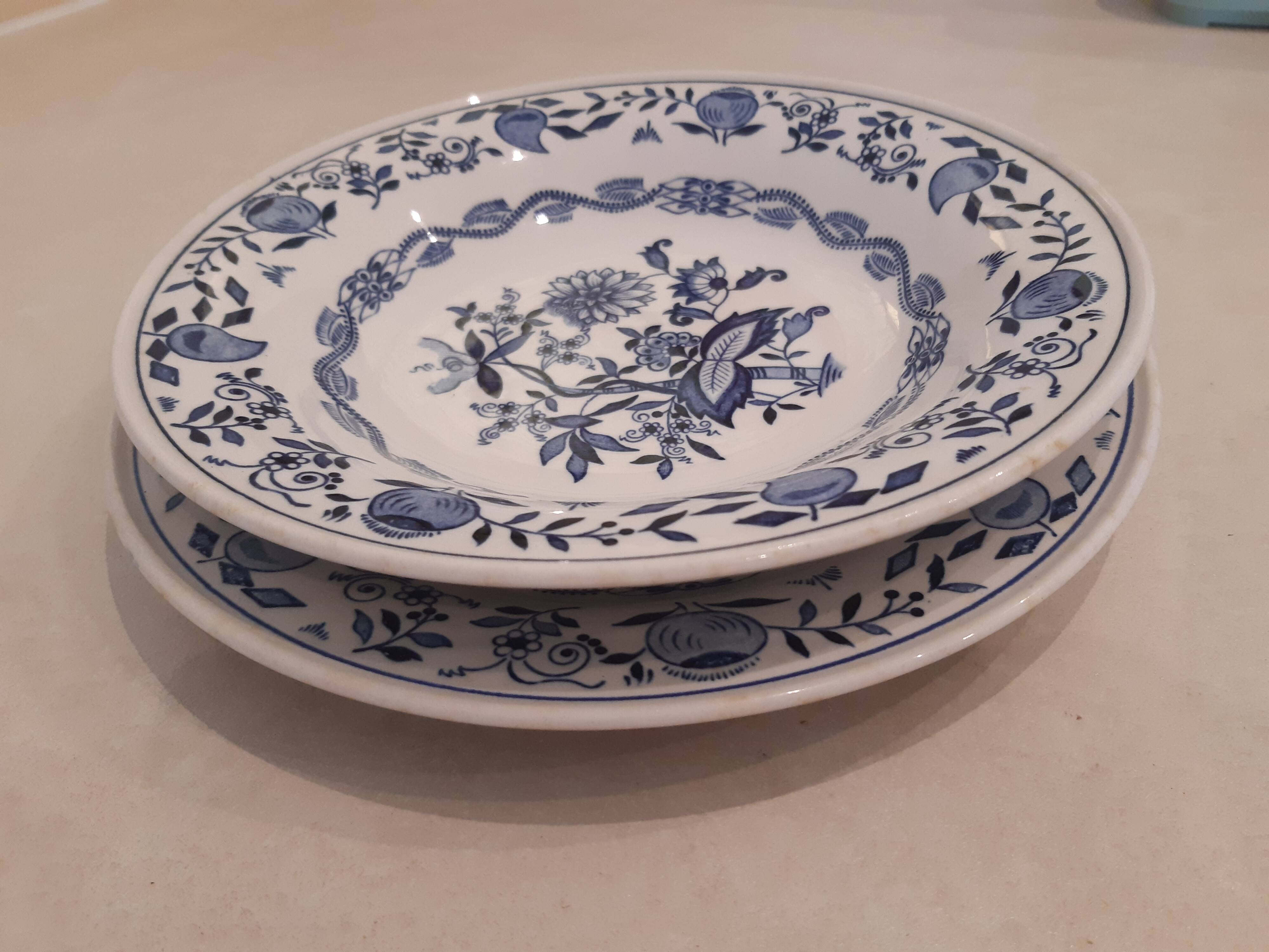 Set of two plates, flat and deep, with a country blue decoration.