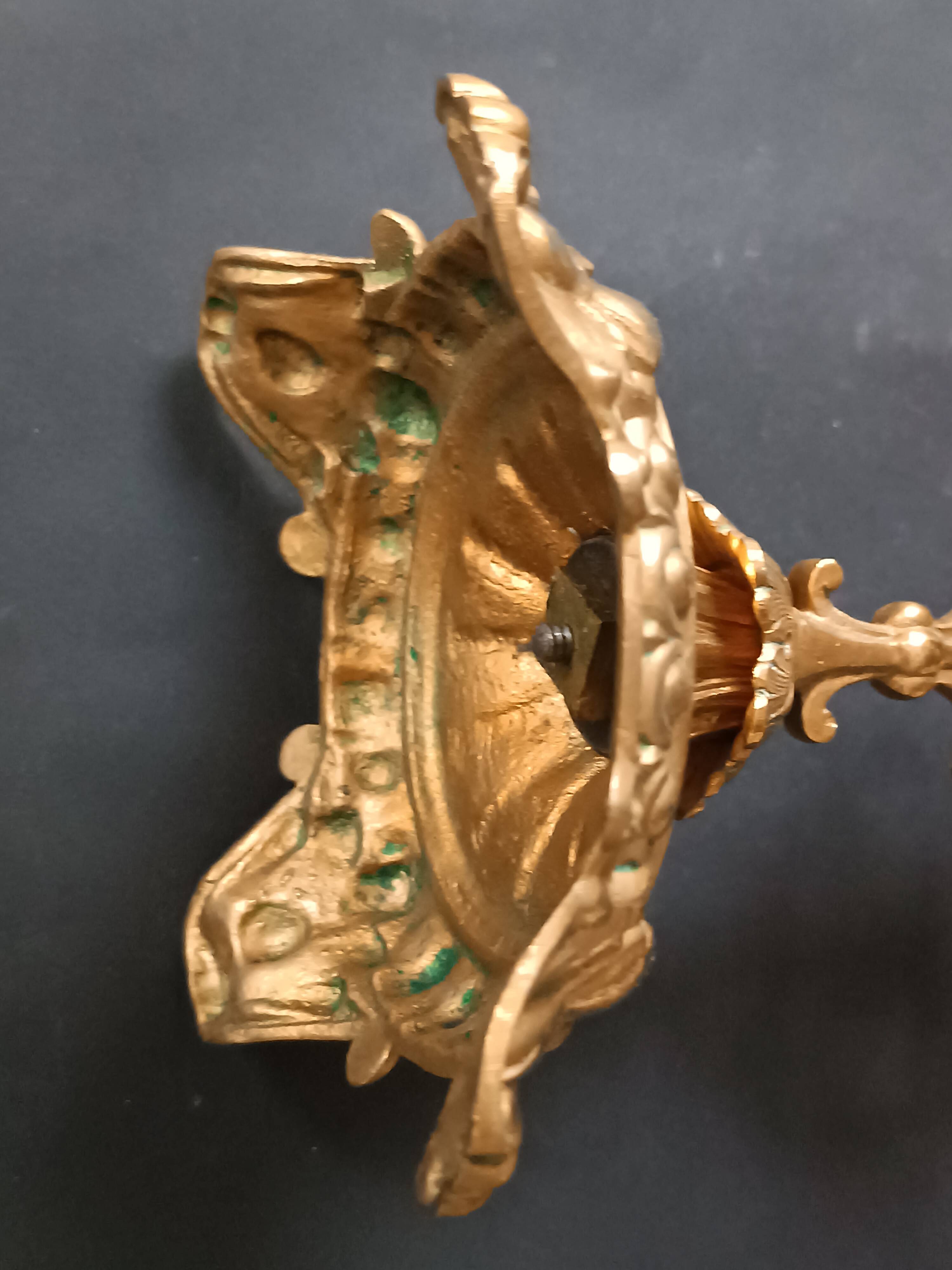 Antique three-light openwork brass church candelabrum.