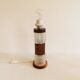 Swedish table lamp, made of what looks like rosewood and crystal glass.