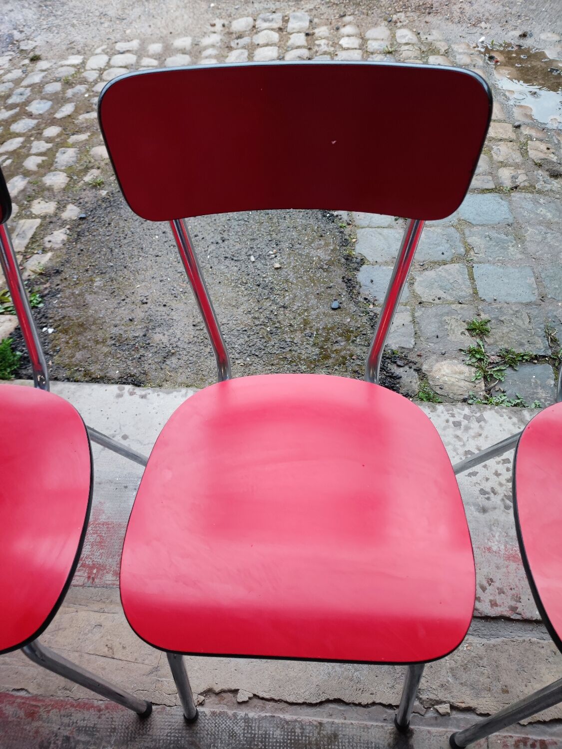 6 red and chrome Formica chairs