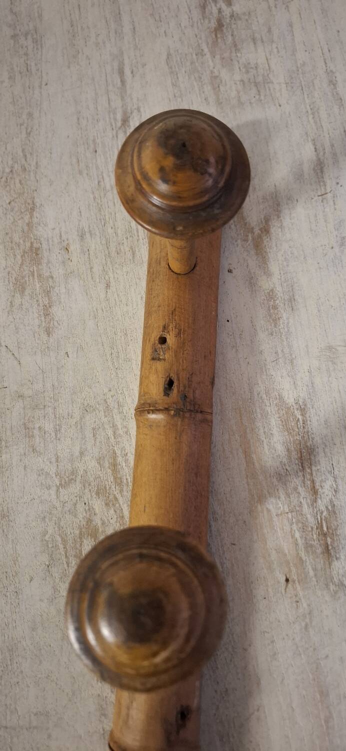 Turned wooden coat rack.