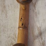 Turned wooden coat rack.