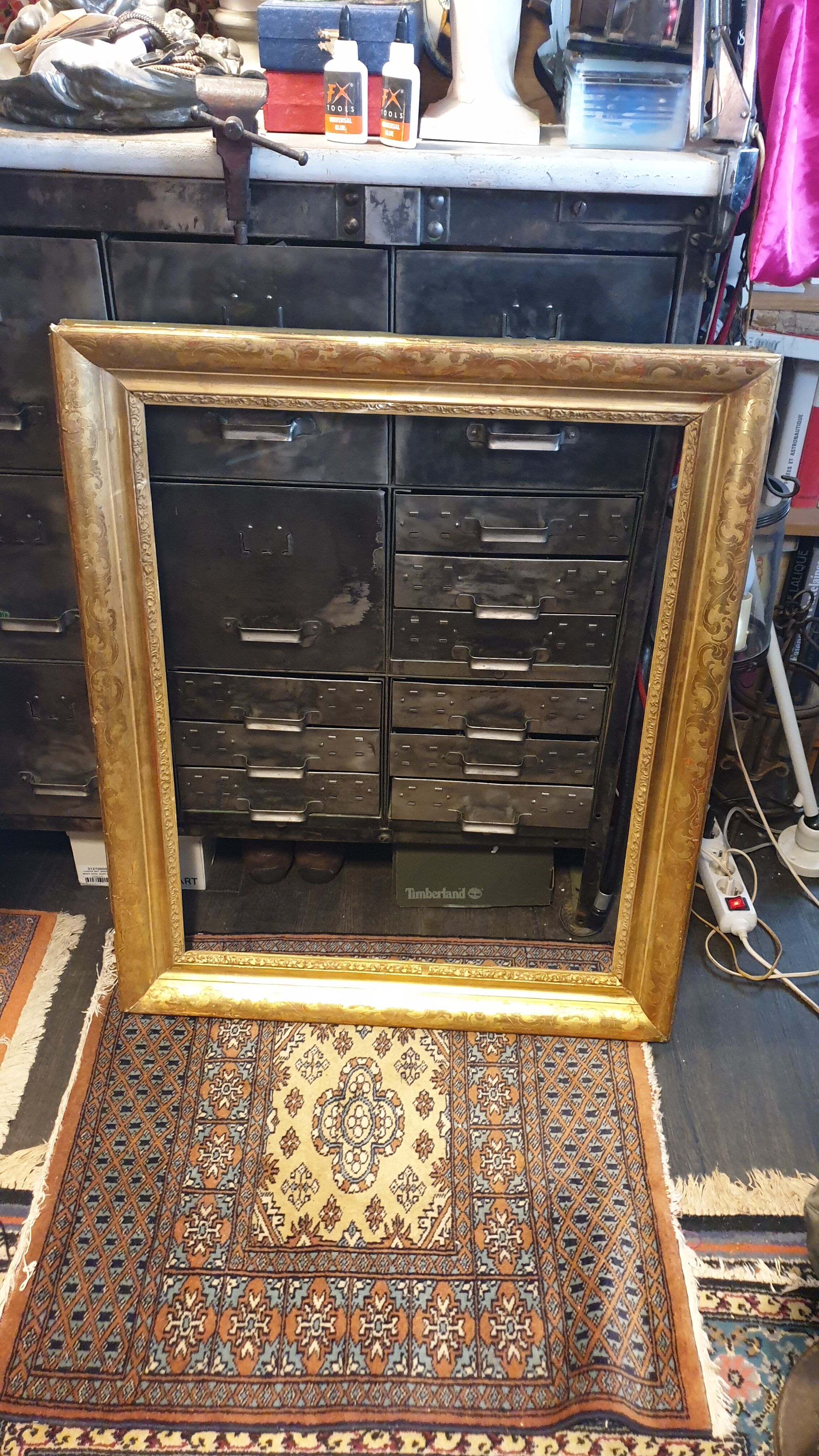 Nineteenth wood frame and gilded stucco