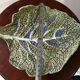 Vintage ceramic leaf-shaped vide poche, signed.