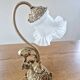 Art Nouveau bedside lamp in bronze with a tulip shape.