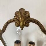 Wall lamp in Louis XV style in brass, shell decoration.