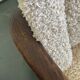 Melchiorre Bega armchair in beige bouclé