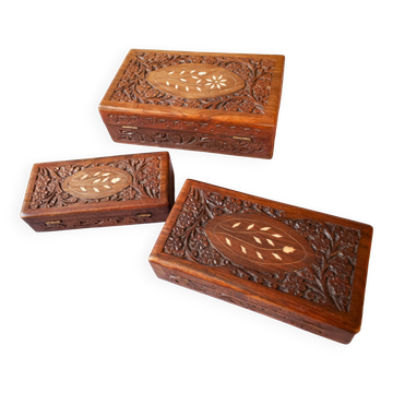 Antique hand-carved wooden boxes.