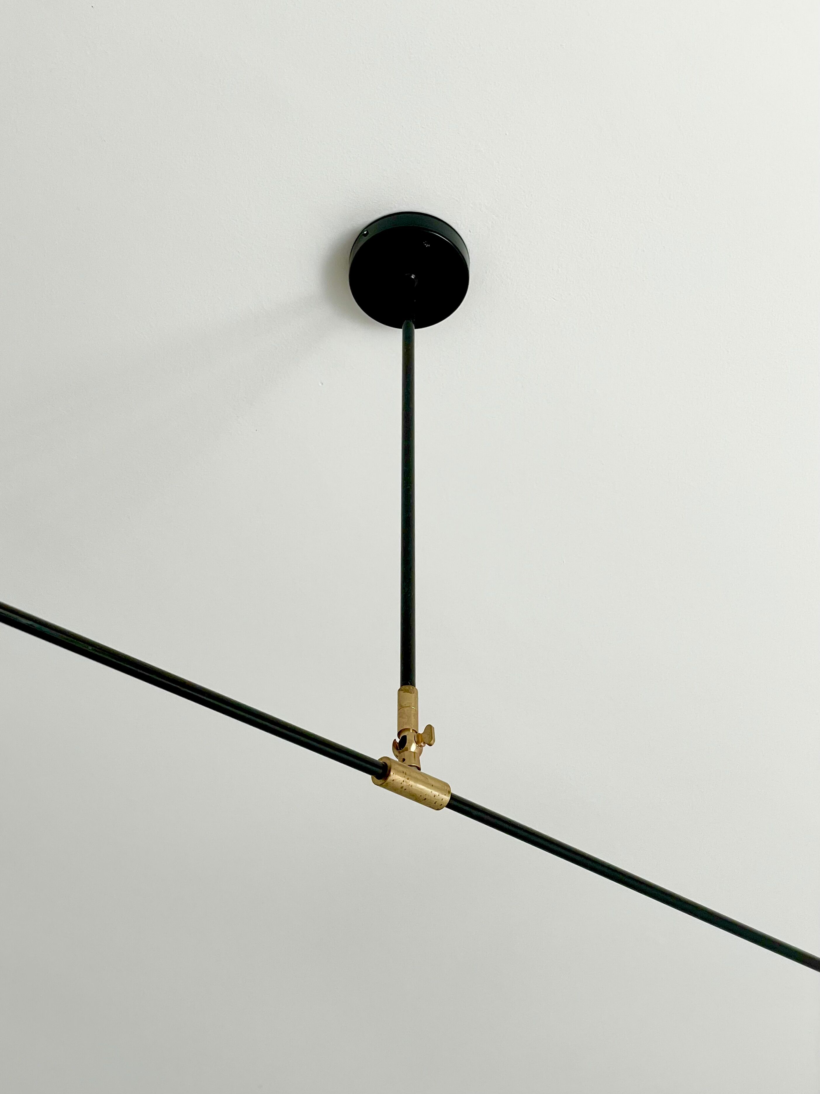 Porcelain lamp and articulable metal
