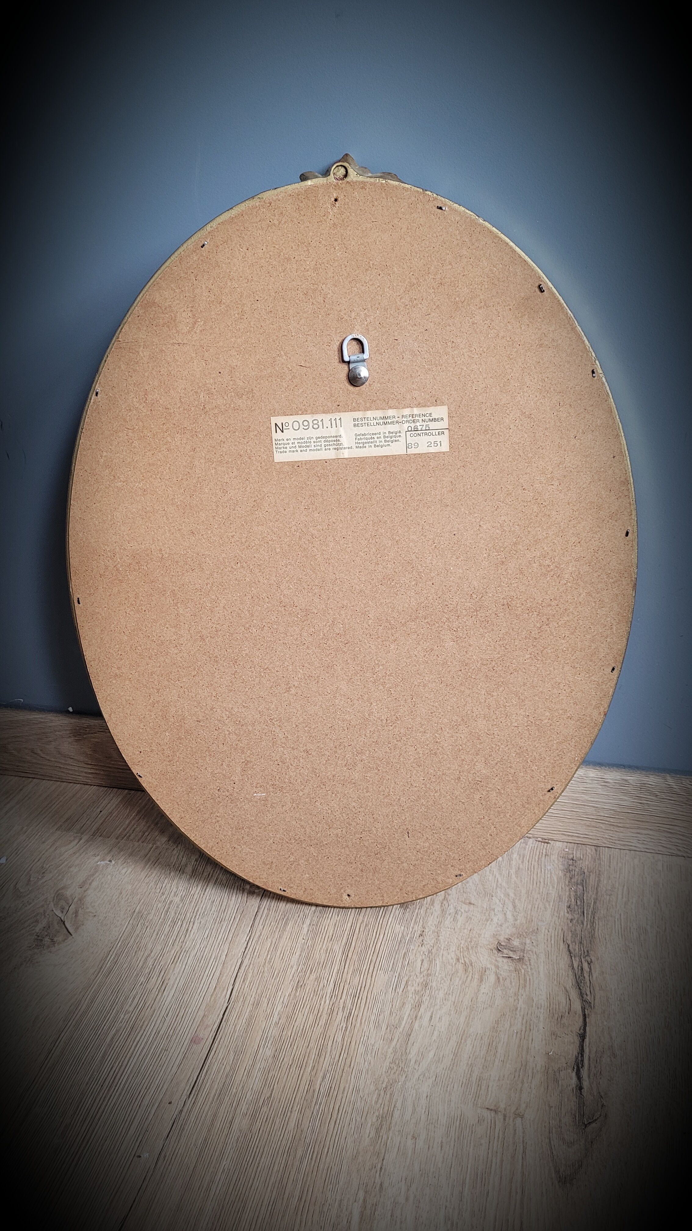 Golden oval mirror 34x46cm