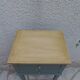 Bedside table, coffee table enhanced in smoky green, wooden top.