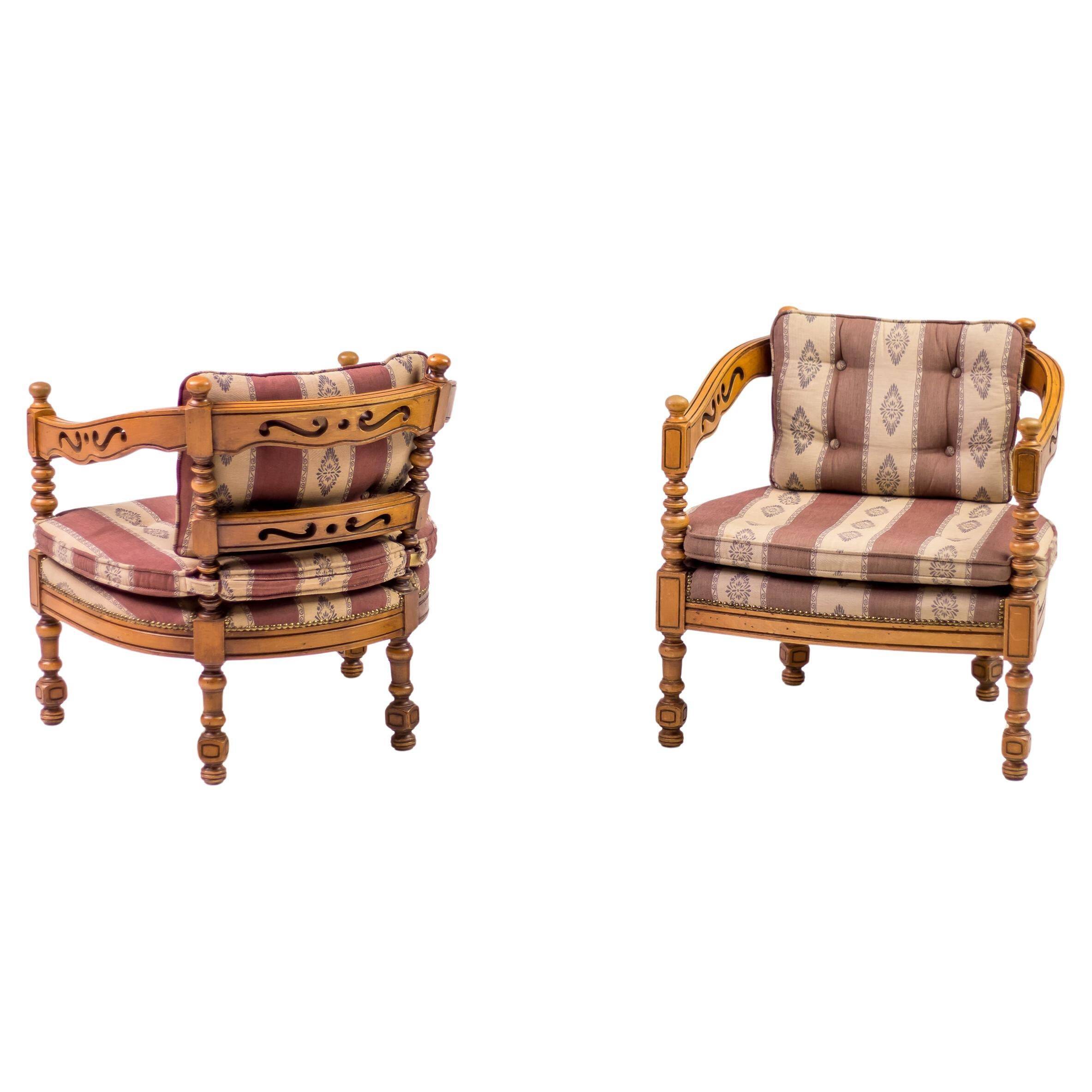 Pair of Giorgetti "1975 Gallery" armchairs in carved wood, original upholstery.