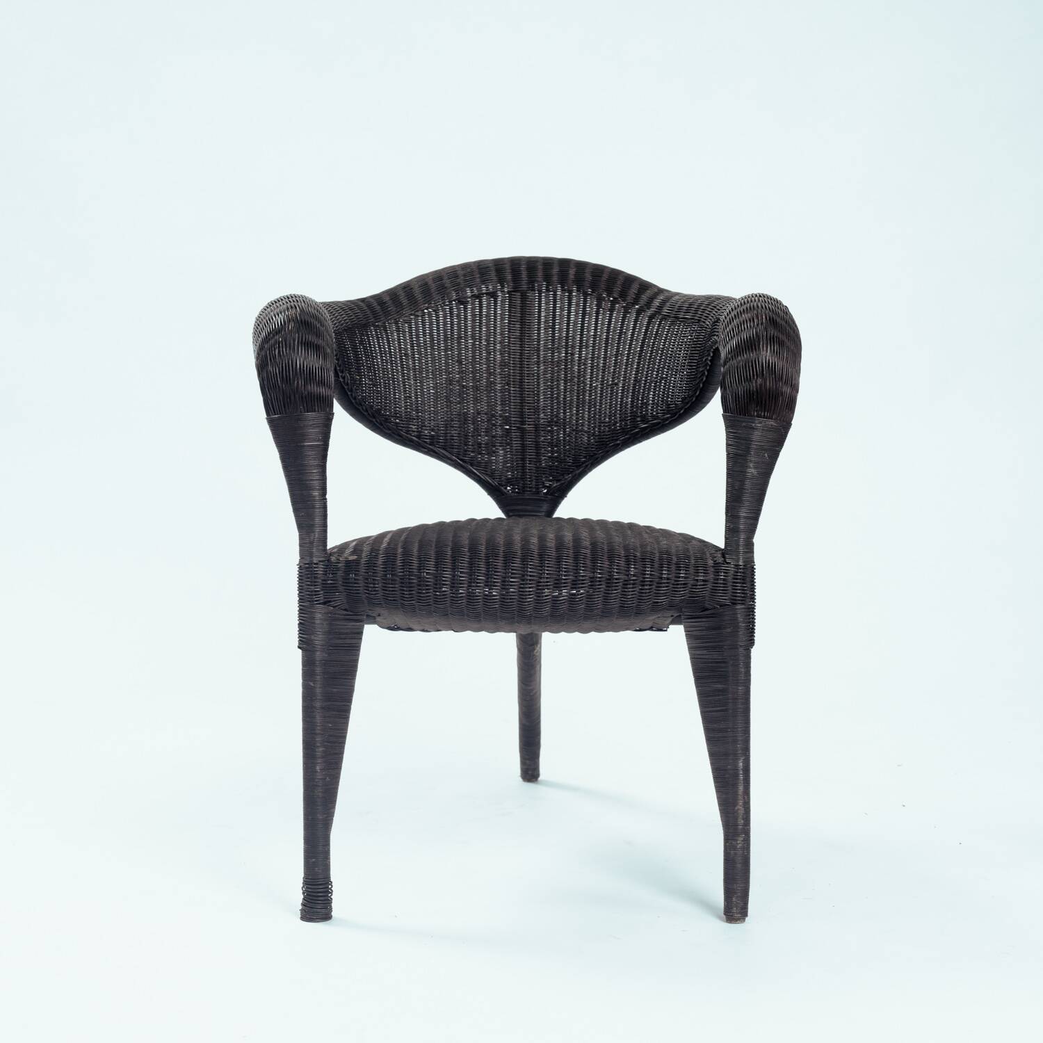 Sculptural rattan tripod armchairs in the manner of Boris Sipek