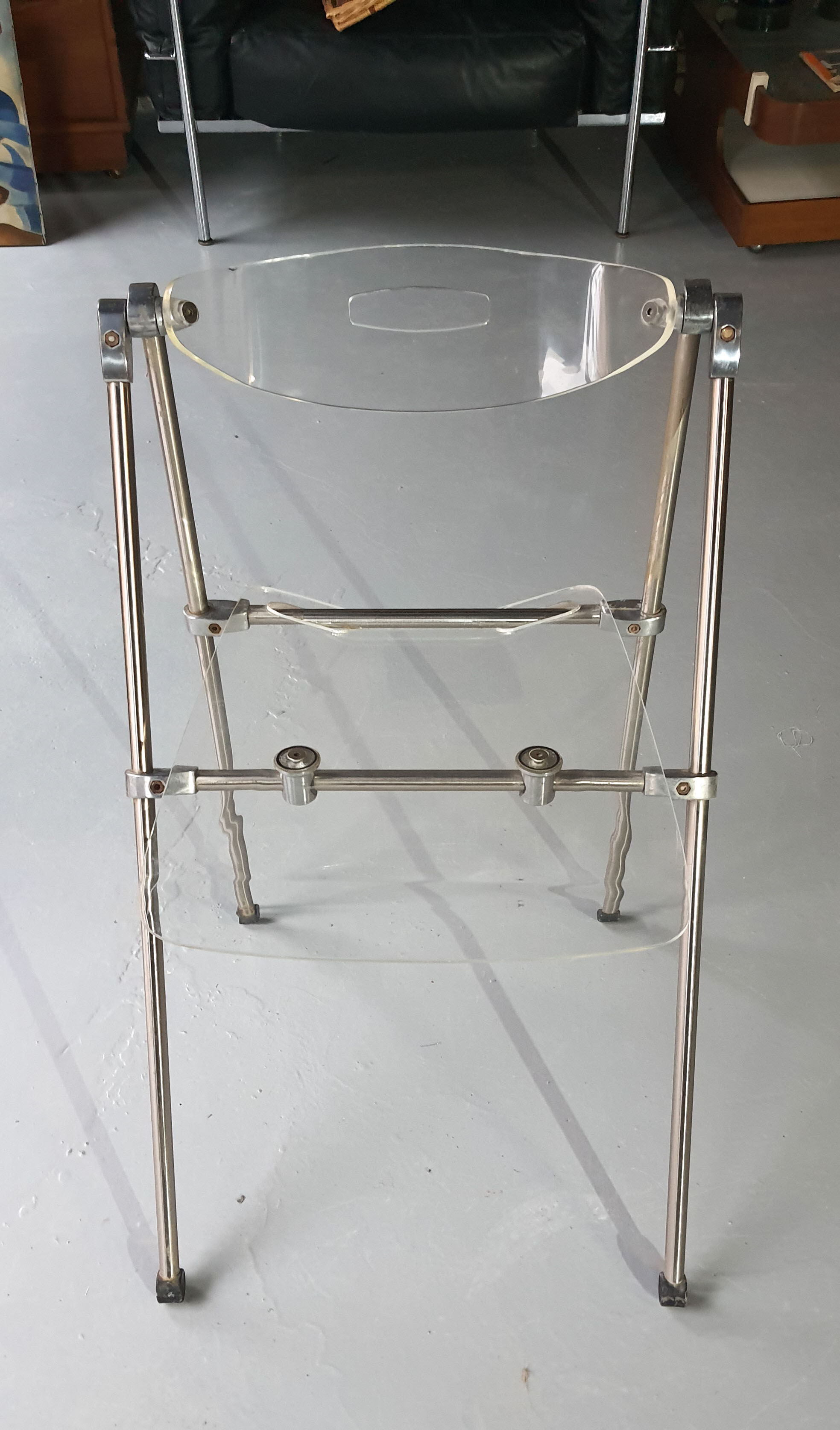 Modern folding chair in plexiglass Giancarlo Piretti - EDA Concept