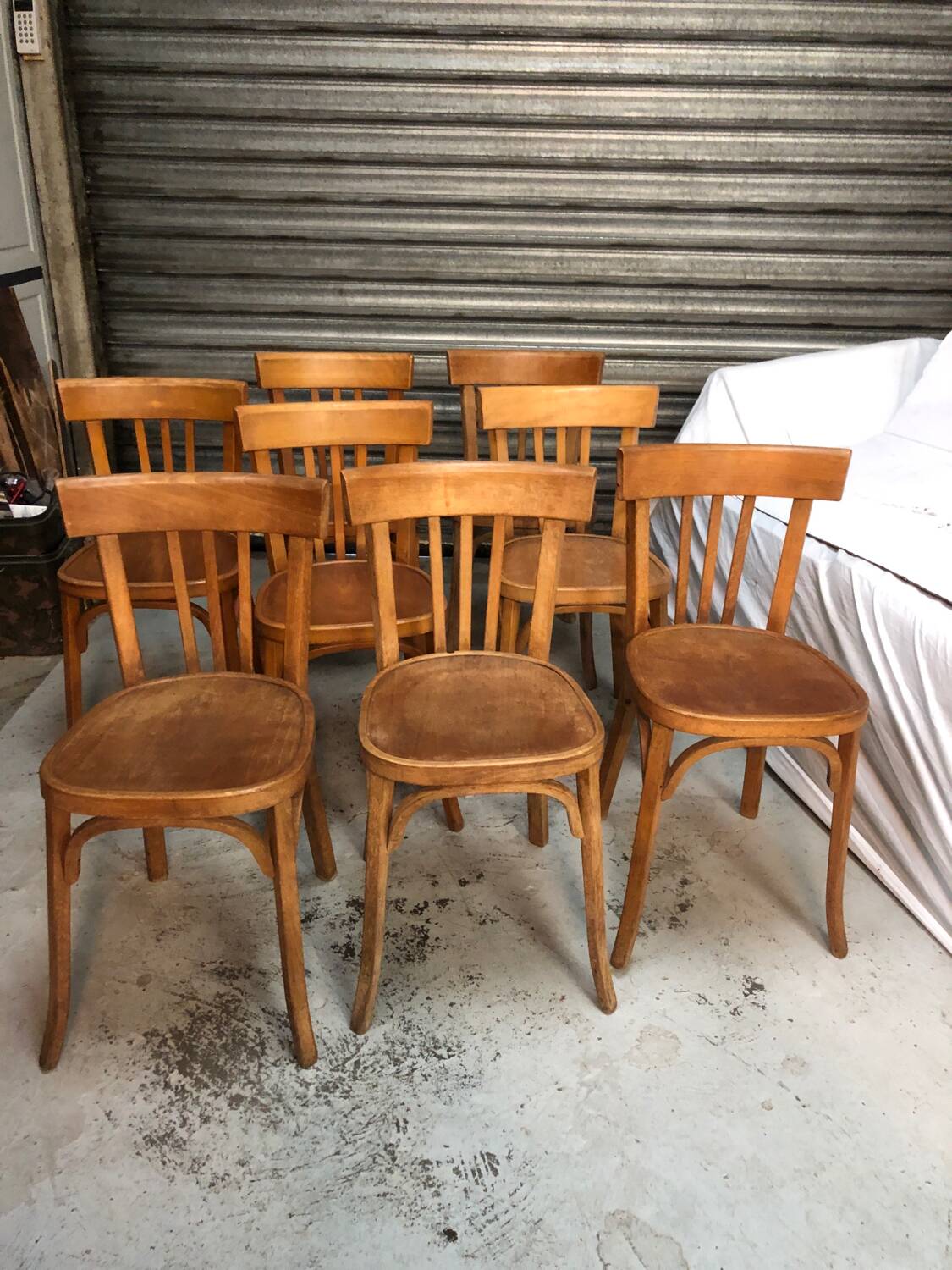 8 antique Baumann bistro chairs