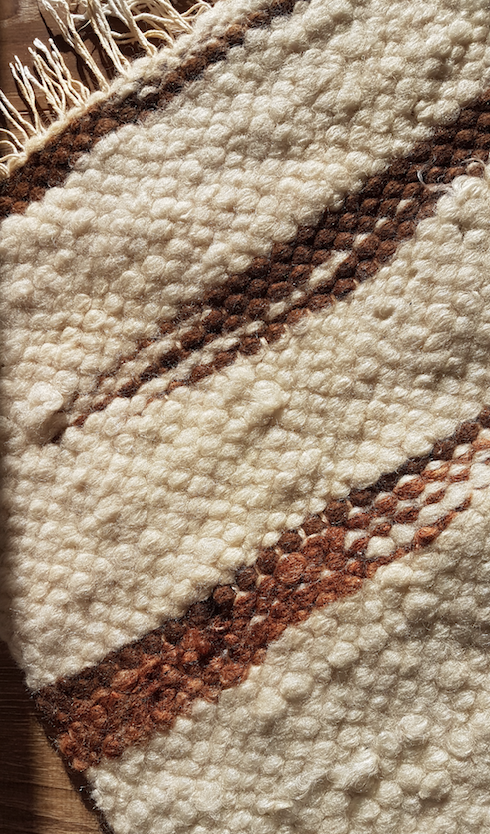 Vintage wool atisanal carpet