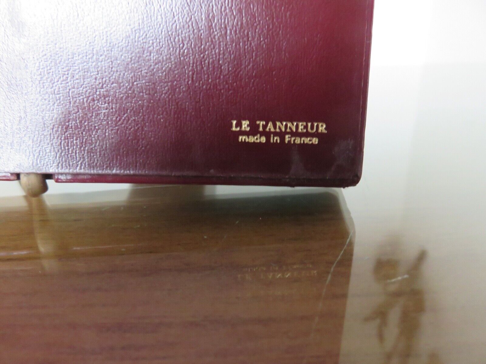 Lamp "the tanner" in burgundy leather 60s 70s