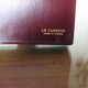 Lamp "the tanner" in burgundy leather 60s 70s