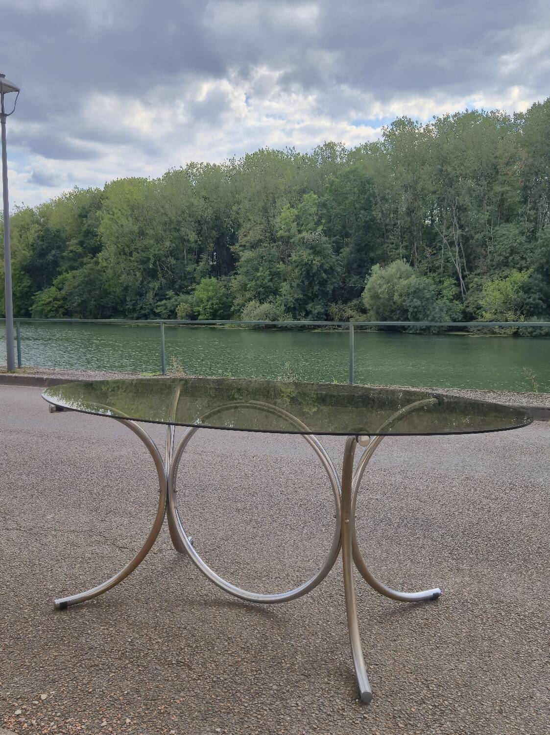 Vintage oval design table in smoked glass and chrome legs