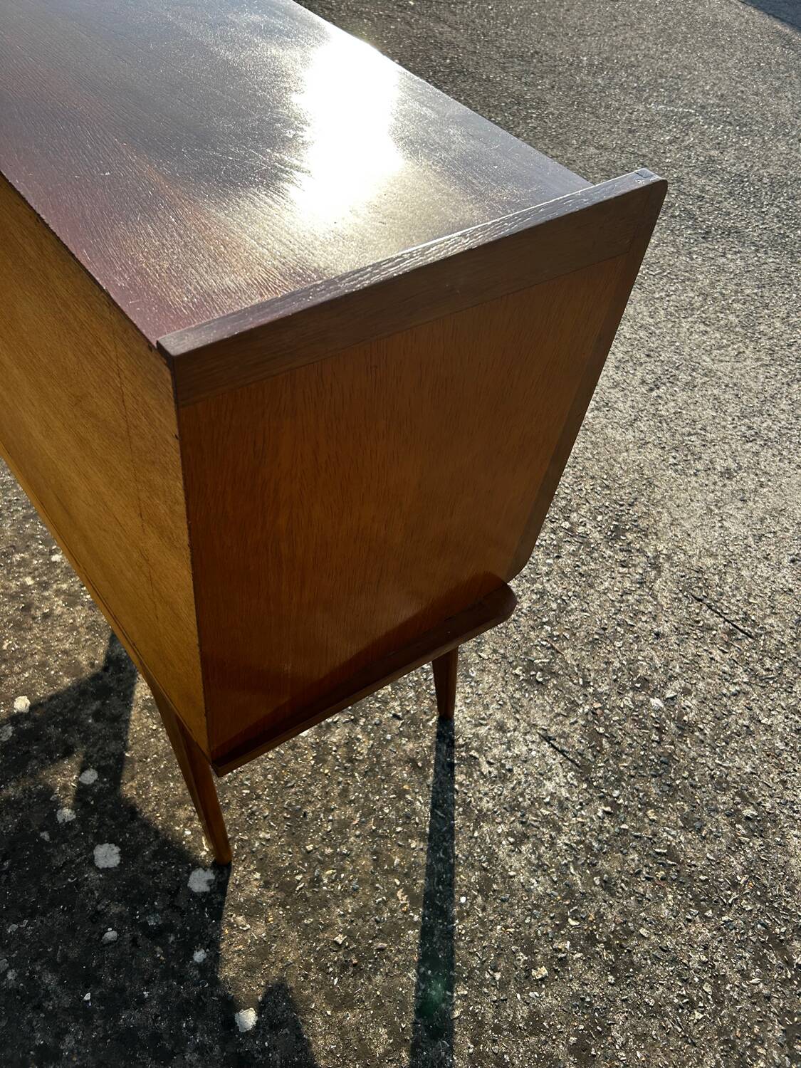 Vintage chest of drawers with compass feet.