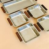 Service of Scandinavian dishes in stainless steel and teak 1970