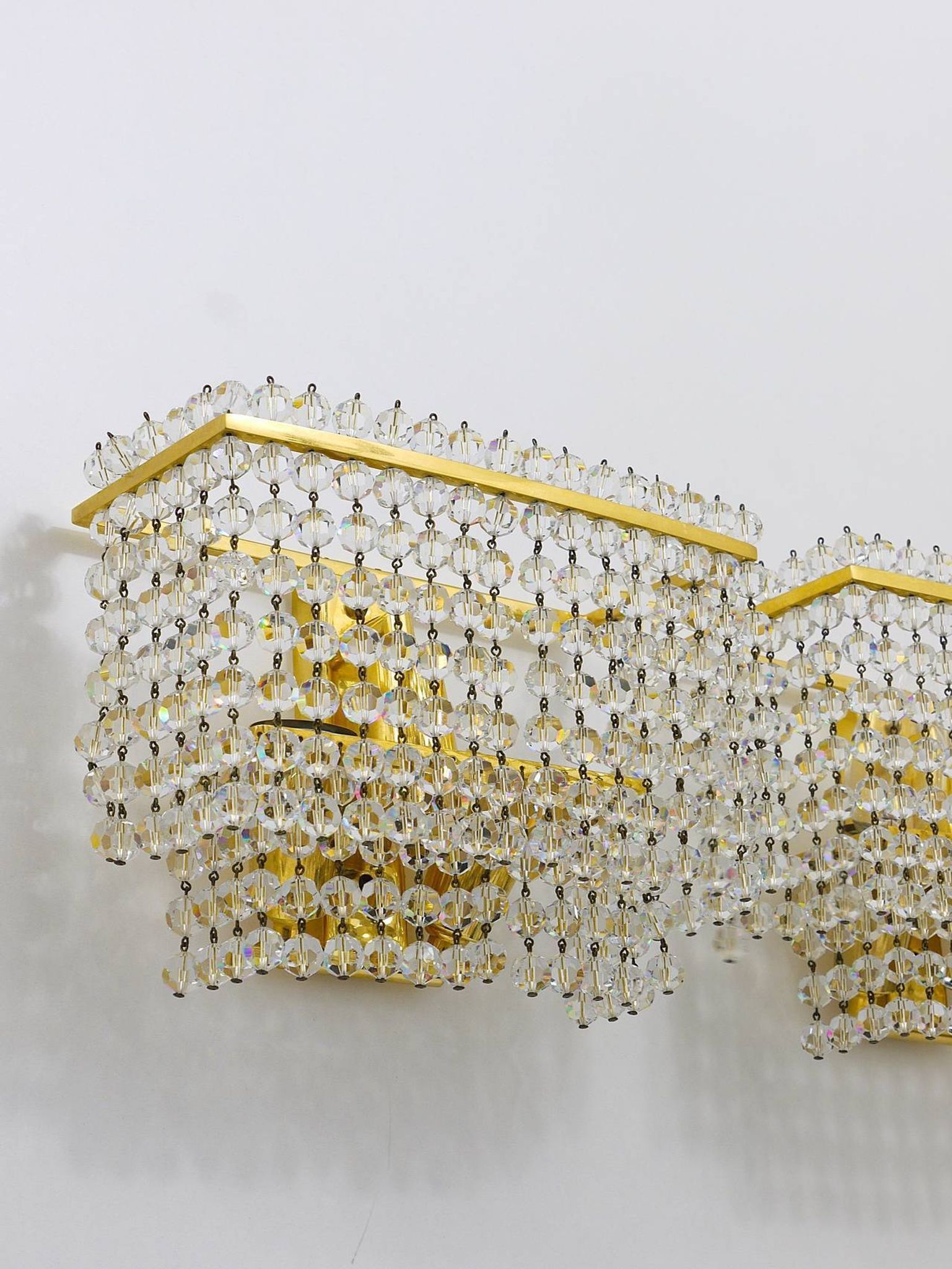Pair of square wall sconces in gilded brass with hand-cut crystals, 1970s.