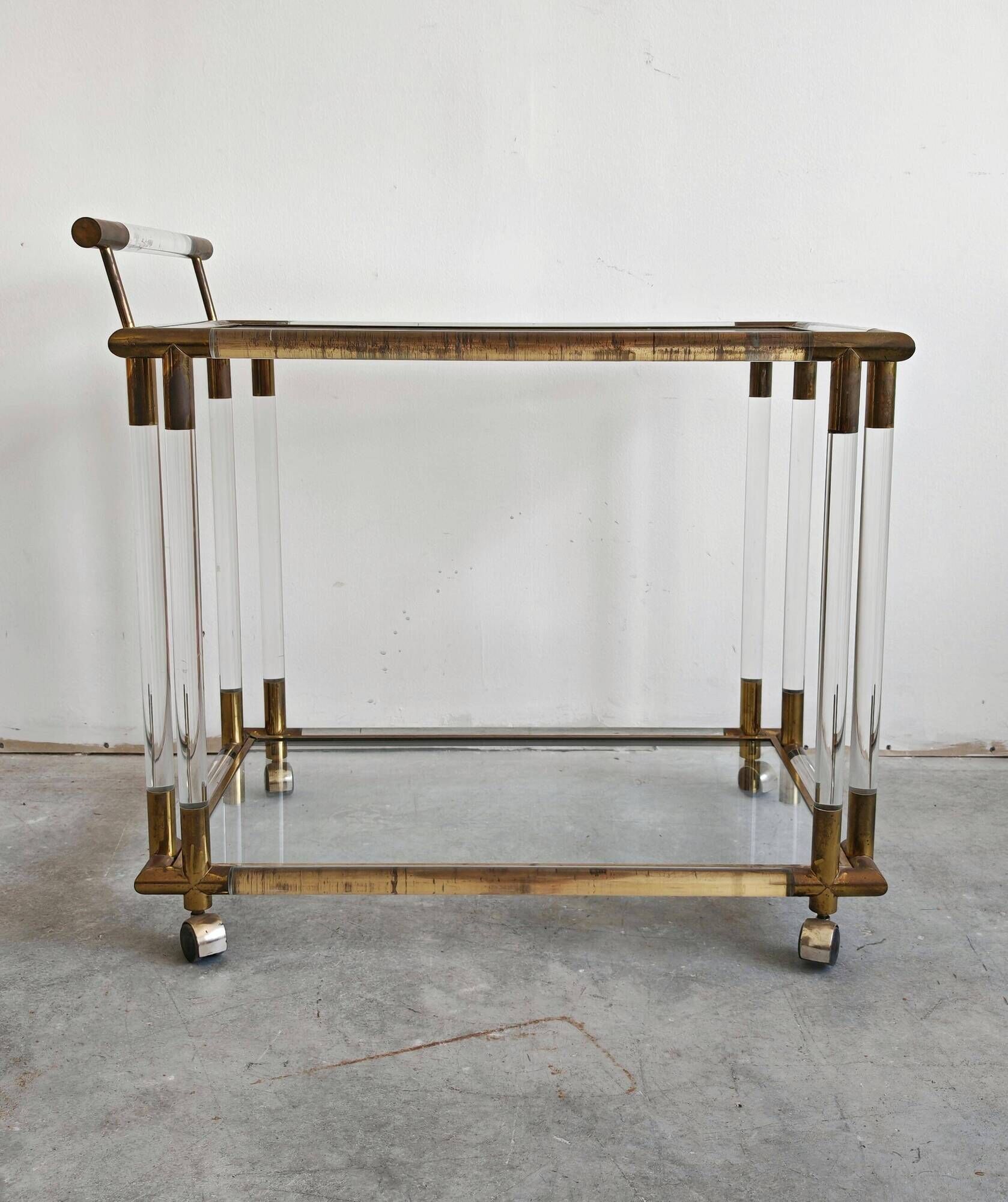 Modern mid-century bar cart in lucite, bronze, and glass, 1970s