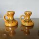 Pair of orange ceramic candlesticks from the 60s